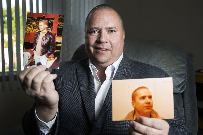 leif gregersen holding two photos of himself as a younger man