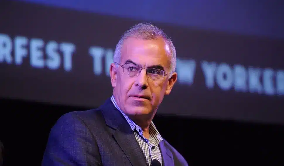 A Photo of David Brooks Looking Away