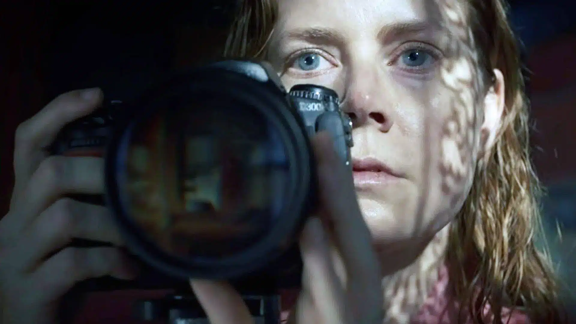 Amy Adams as Anna Fox Holding a Camera