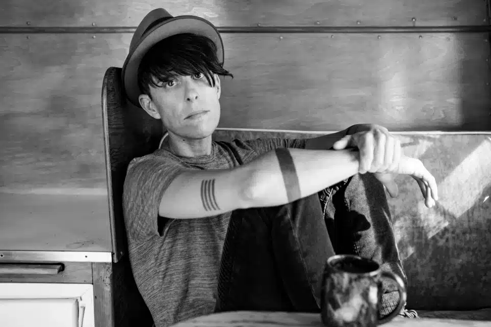 Andrea Gibson Sitting in a Chair