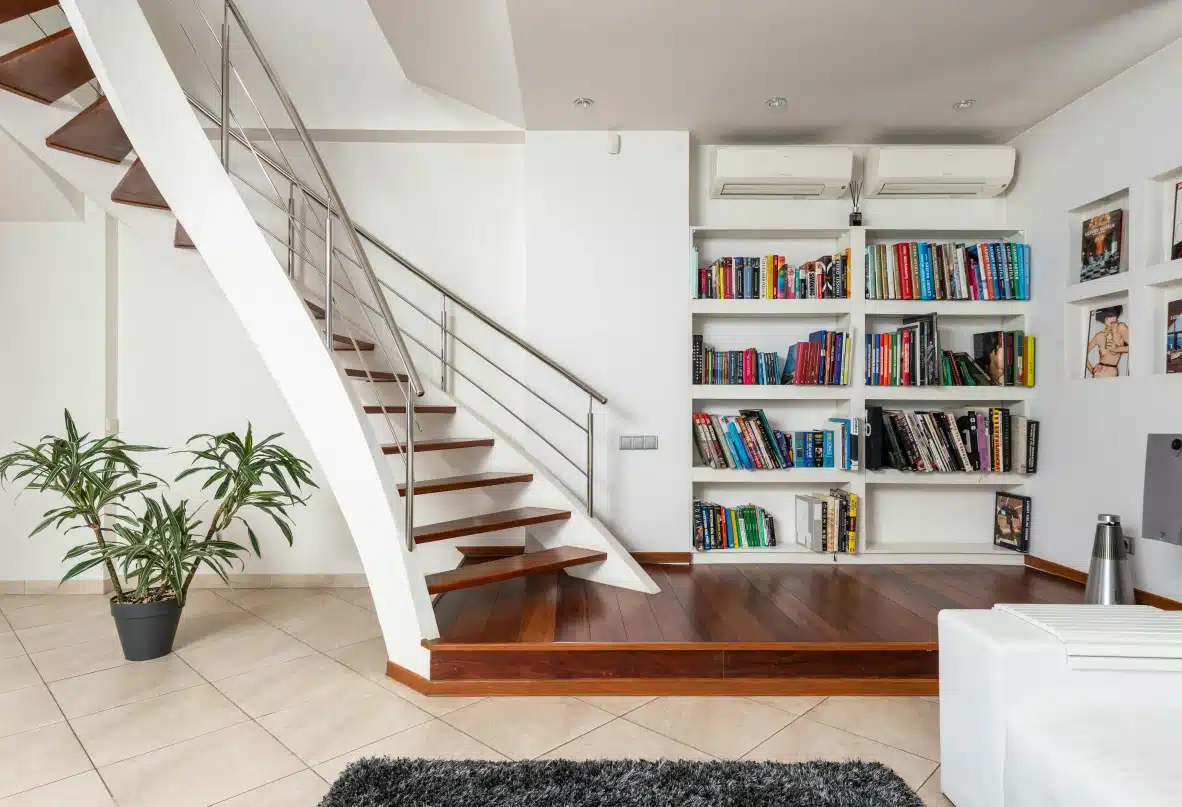 Book Shelves Next to a Staircase