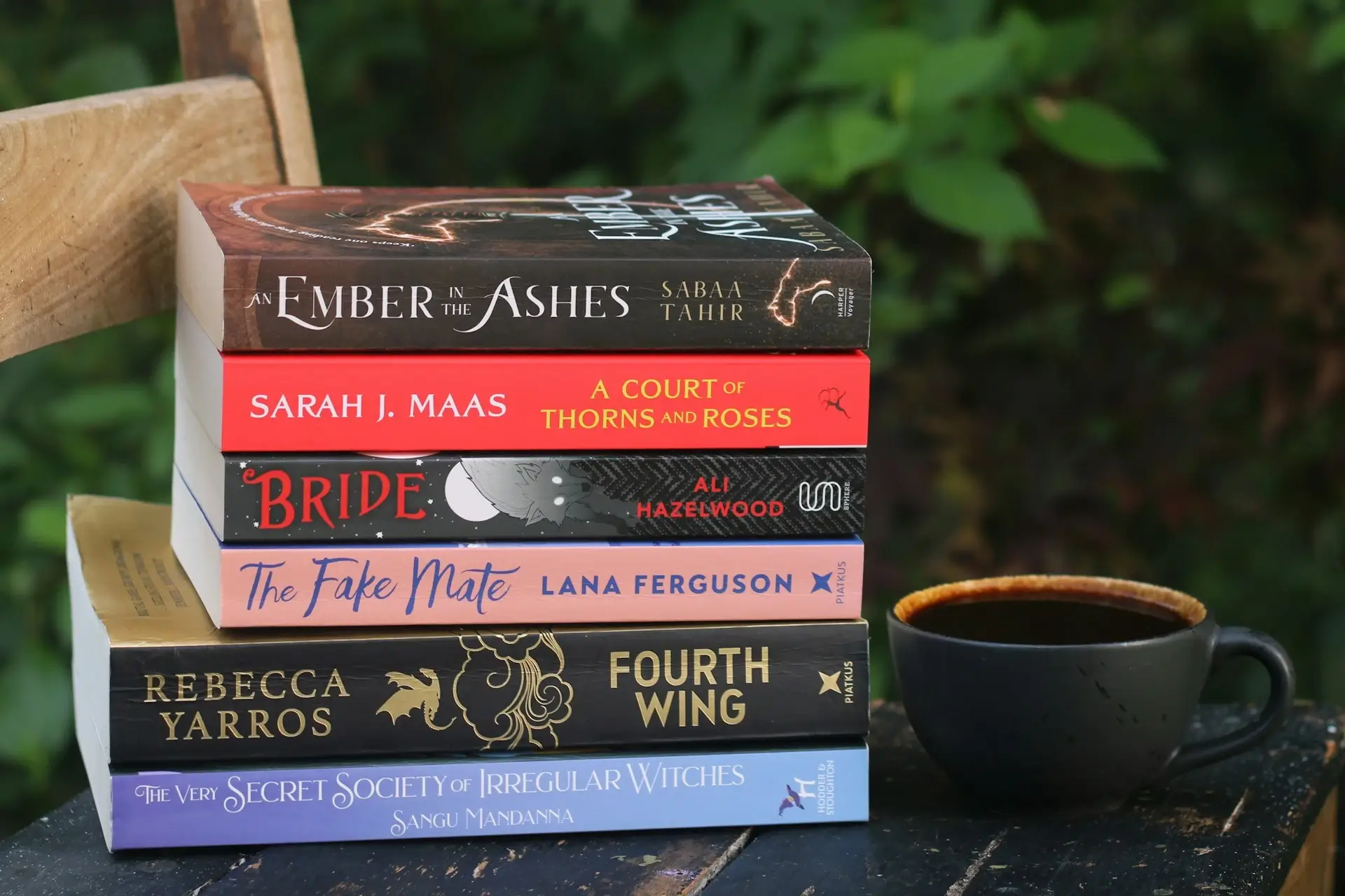 A Stack of Paperback Romantasy Novels